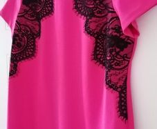 Dress size 18 deep pink with black lace detailing zip opening at back