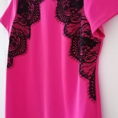 Dress size 18 deep pink with black lace detailing zip opening at back