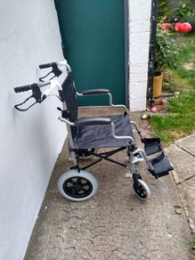Wheelchair, new, unused.