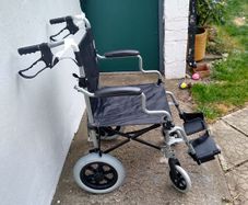 Wheelchair, new, unused.