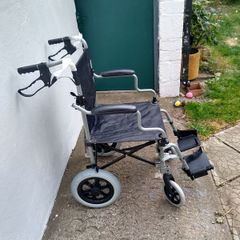 Wheelchair, new, unused.