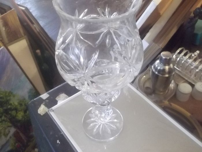 a cut glass candle holder