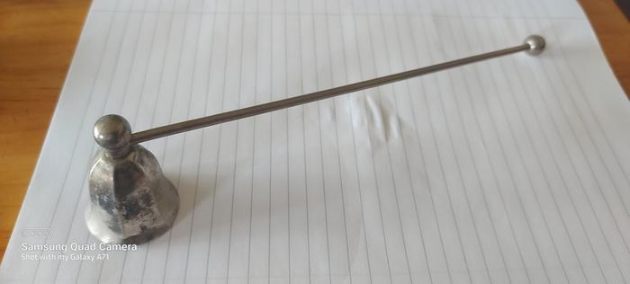 Candle metal snuffer ,,good patina for its age ,sold as seen