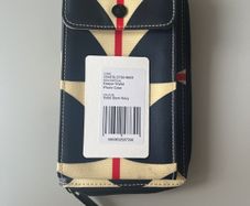 Orla Kiely cross body wallet with integrated phone case