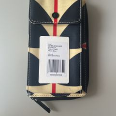 Orla Kiely cross body wallet with integrated phone case