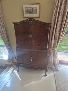 Antique drinks cabinet and contents