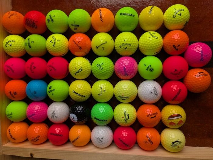 Coloured golf balls