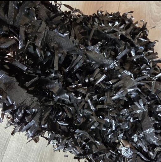Black decorating tinsel, 23 meters