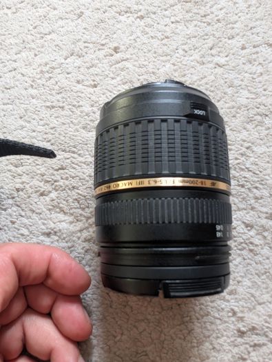 Nikon D7000 DSLR + Nikon 50mm f/1.8G + Tamron 18-200mm + Tripod + Camera Bag