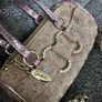 vintage Guess Y2K small monogram bag in a brown and pink glitter colorway. Image 3