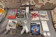 Wii Bundle with Pokemon, Mario Bros, Sports and Sports Resorts