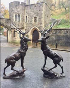 Pair of life size bronze deer statues