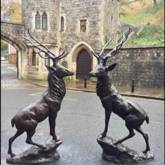 Pair of life size bronze deer statues