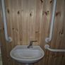 Disabled toilet, sink and handrails Image 3