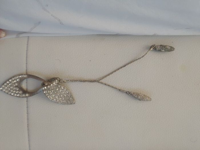 Silver pendant with rhinestones