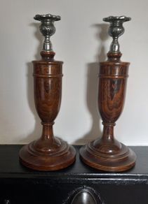 Pair of oak candlesticks.