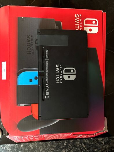 Nintendo Switch Neon Red/Blue with Improved Battery Life- Barely used