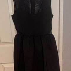 Black dress with mesh panels