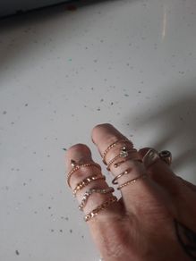 8 gold coloured rings