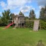 Playhouse and swings Image 2