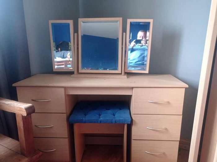A wardrobe and dressing table