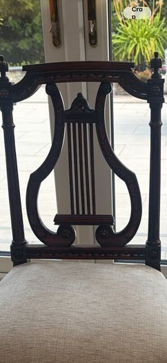Set of six vintage carved harp back dining chairs