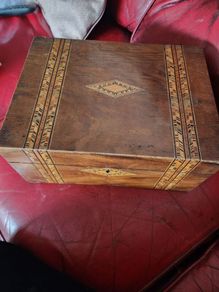 large inlayed box. 12 inches wide9 inches deep.