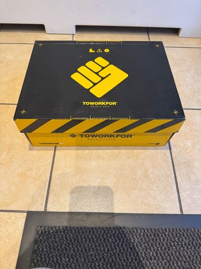 Steel toe safety boots.
