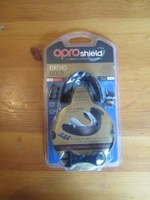 ORTHO shield   gold