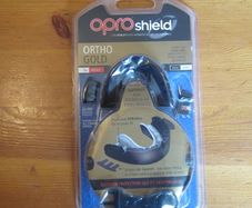 ORTHO shield   gold