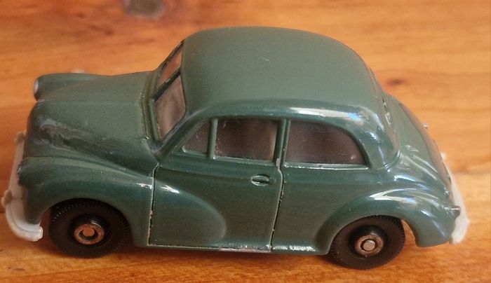 4 vintage toy cars -