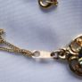 Gold Plated Necklace with Purple Stone. Stone is Multifaceted & Sparkles in the Light. Image 4
