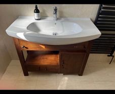 bathroom vanity with sink and taps