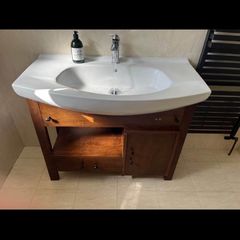 bathroom vanity with sink and taps