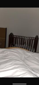 Baby cot, dark wood finish