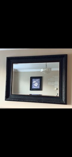 Black rectangle mirror with gold stud detail
