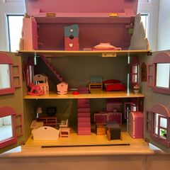 Large wooden dolls house