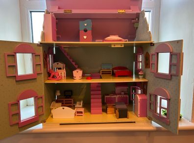 Large wooden dolls house