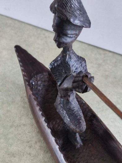 Ebony African caved Fishing Boat.