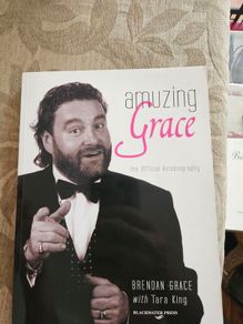 Amuzing Grace. The Official Autobiography.  By Brendan Grace With Tara King. Signed First Edition Paperback In Good Condition.  See Photos For Same.