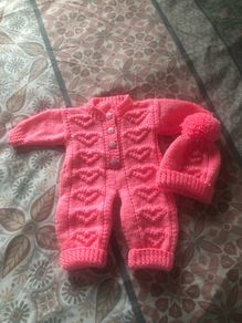 Baby onesie and matching hat with pompom