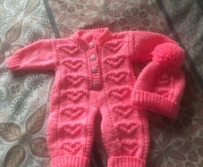 Baby onesie and matching hat with pompom