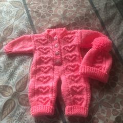 Baby onesie and matching hat with pompom