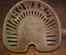 Antique HOWARD K24 Cast Iron Tractor Seat