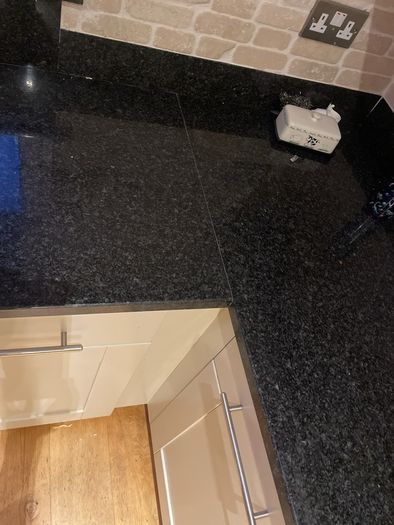 Entire kitchen Quartz work top solid wooden shaker style doors