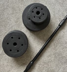 Gym barbell and 3 sets of weights