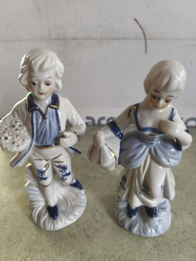 Vintage colonial man & woman blue, white, gold porcelain