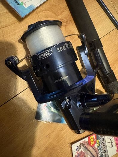 fishing rod and reel read to go sea mackrell pollock rock fishing
