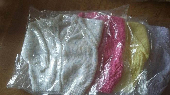Beautiful hand knitted baby cardigans
