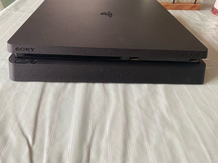 PlayStation 4 PS4 Console with controllers